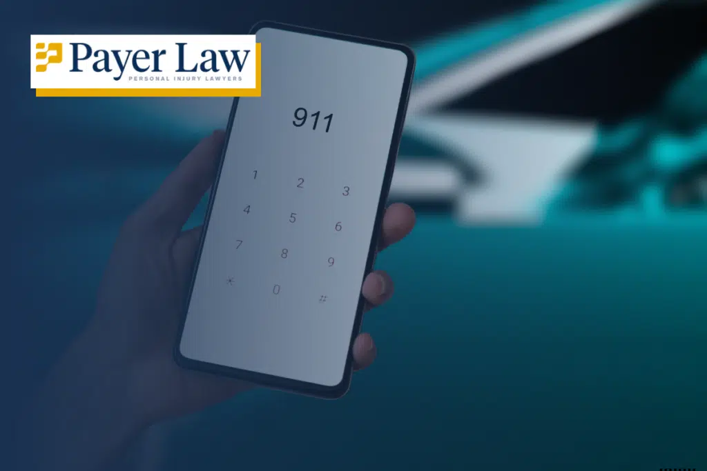 person attempting to dial 911 on smartphone