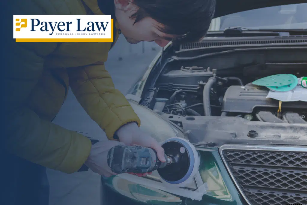 man fixing a headlight