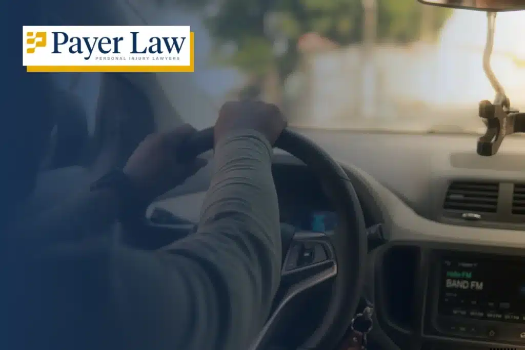 person driving a car