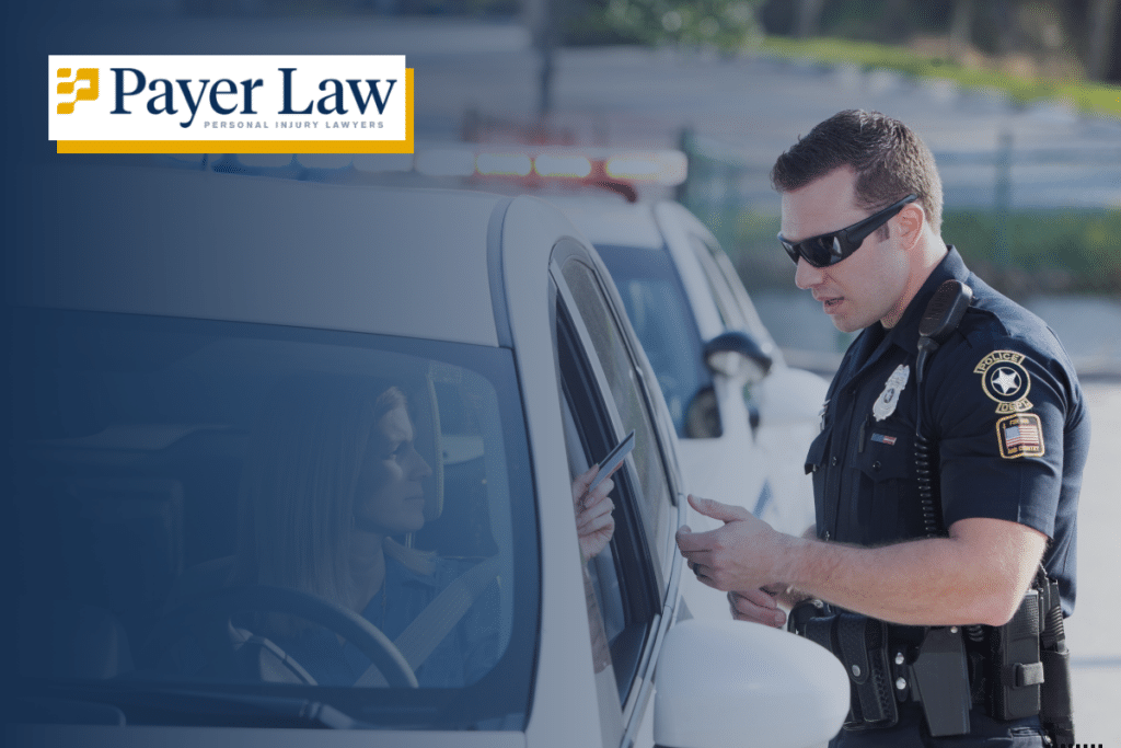 police officer talking to a driver