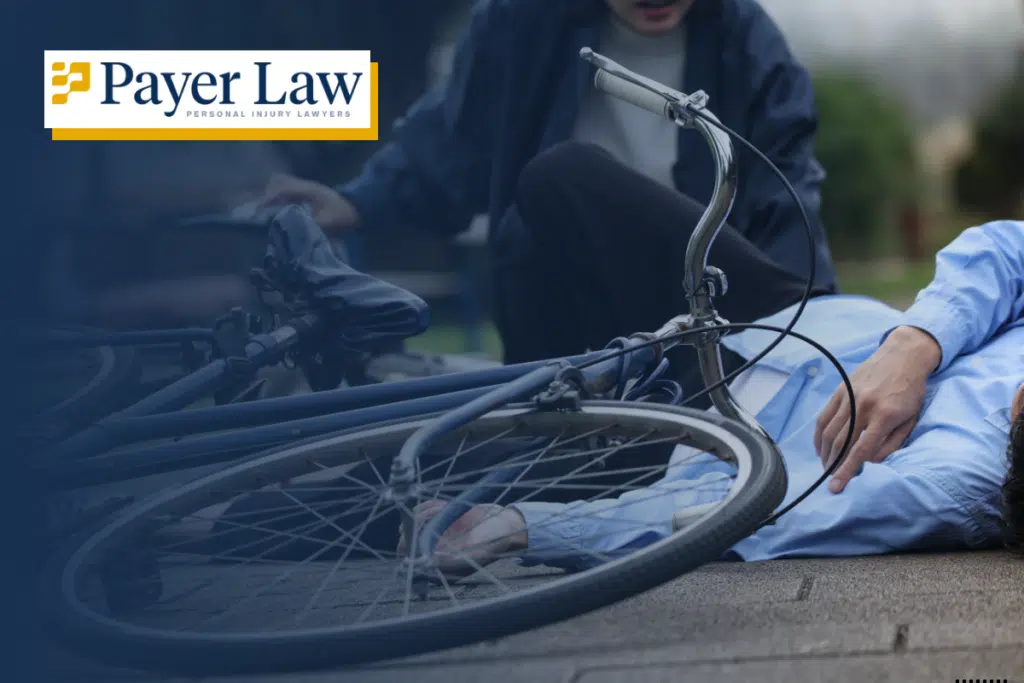 a person on the ground after a bicycle accident in Miami