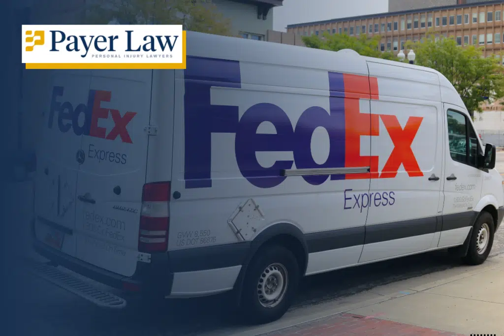 a fedex truck parked on the side of a road