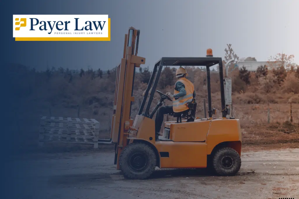 a construction worker driving a forklift