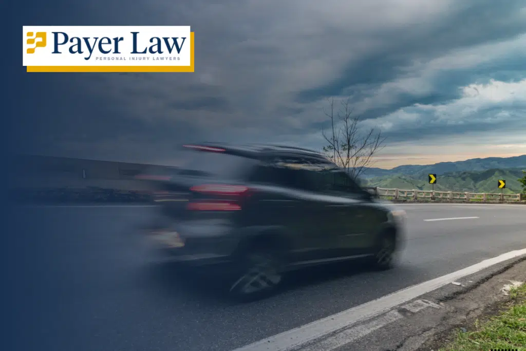 a car speeding down a road