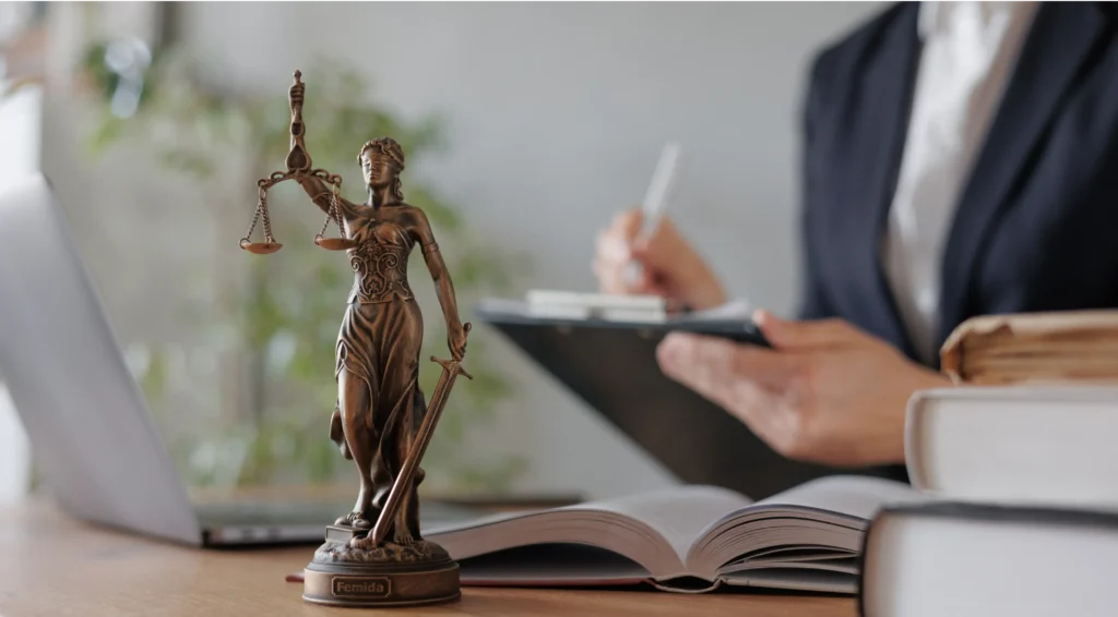 a statuette of the goddess of justice. a symbol of honesty and decency